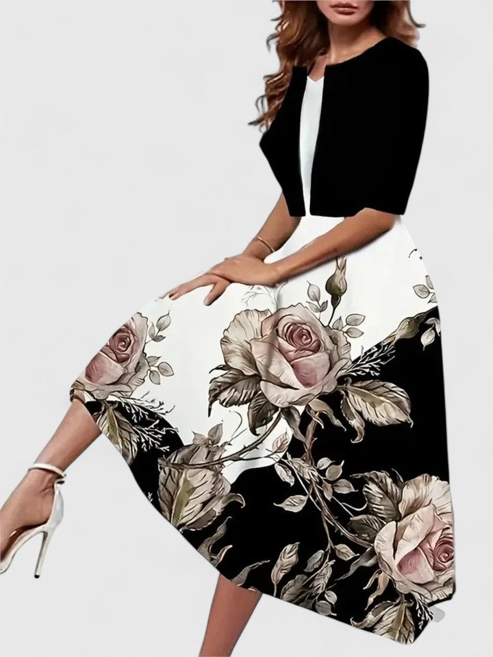 Refined women's midi dress, elegant style with a flattering fit for sophisticated wear.