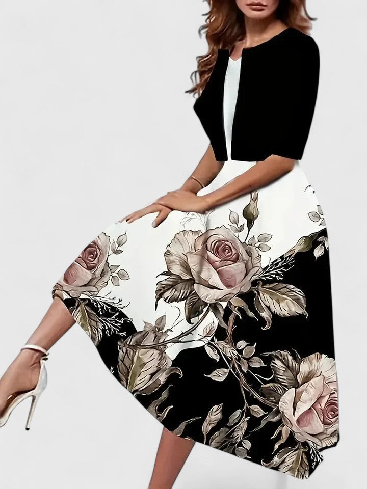 Elegant midi dress, flattering and versatile for a chic, sophisticated look.