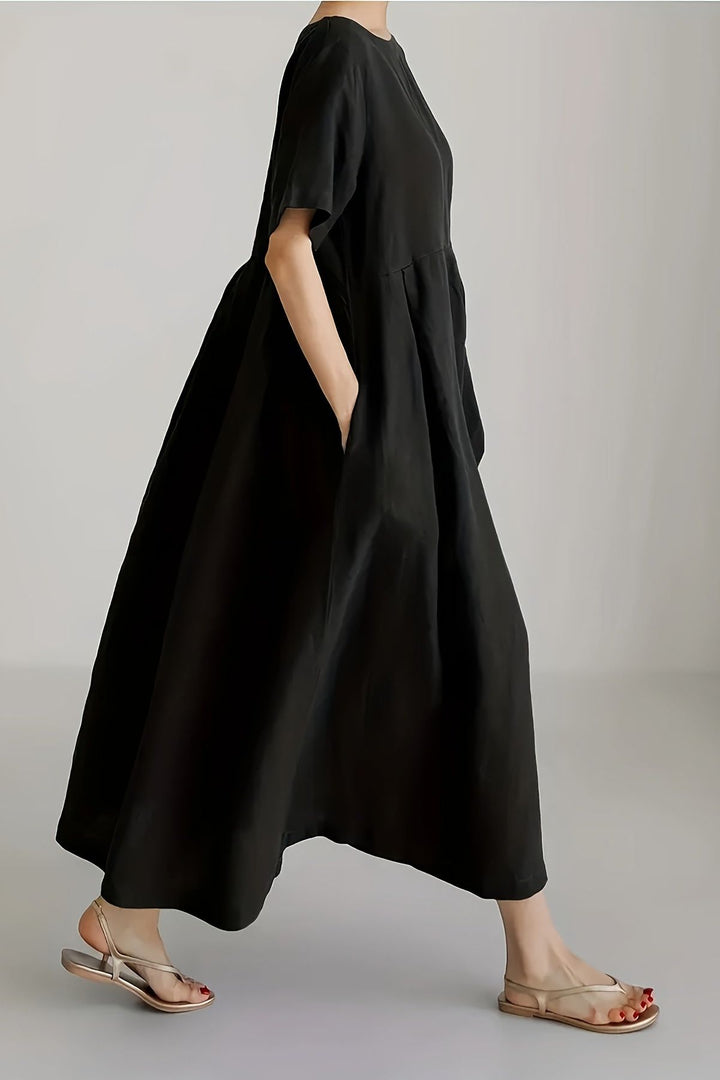 Emerald green women's elegant midi dress. Perfect classic style for a party, evening, or sophisticated date night.