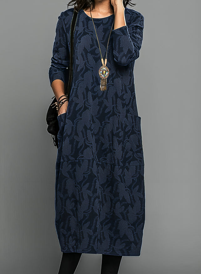 Stylish women's wedding guest midi dress. Elegant design with a flattering silhouette, ideal for special occasions.