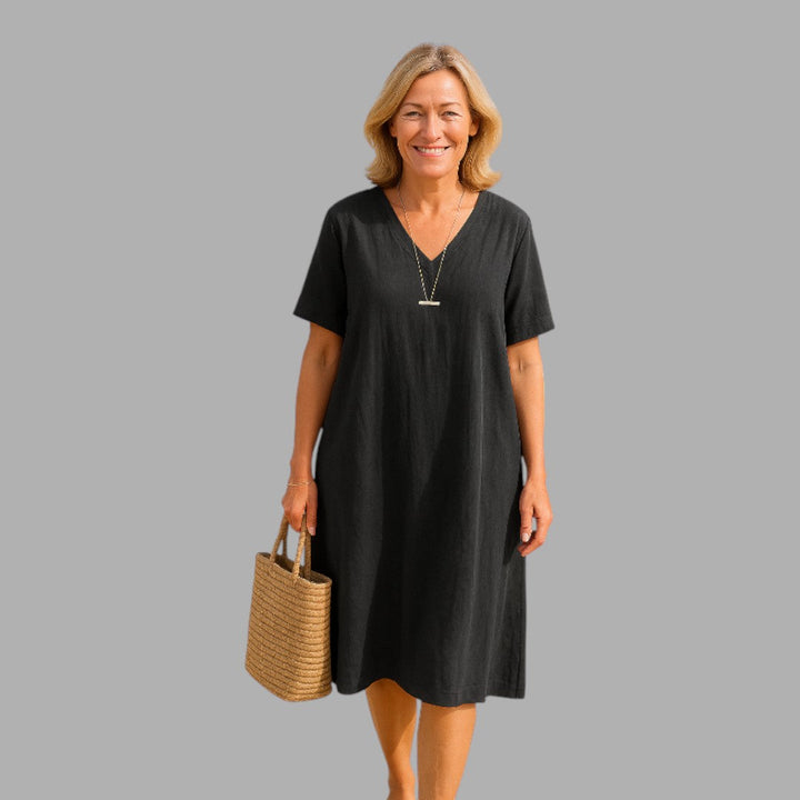 Elegant ladies' midi dress, perfect for evening wear, comfortable and flattering for all body types.