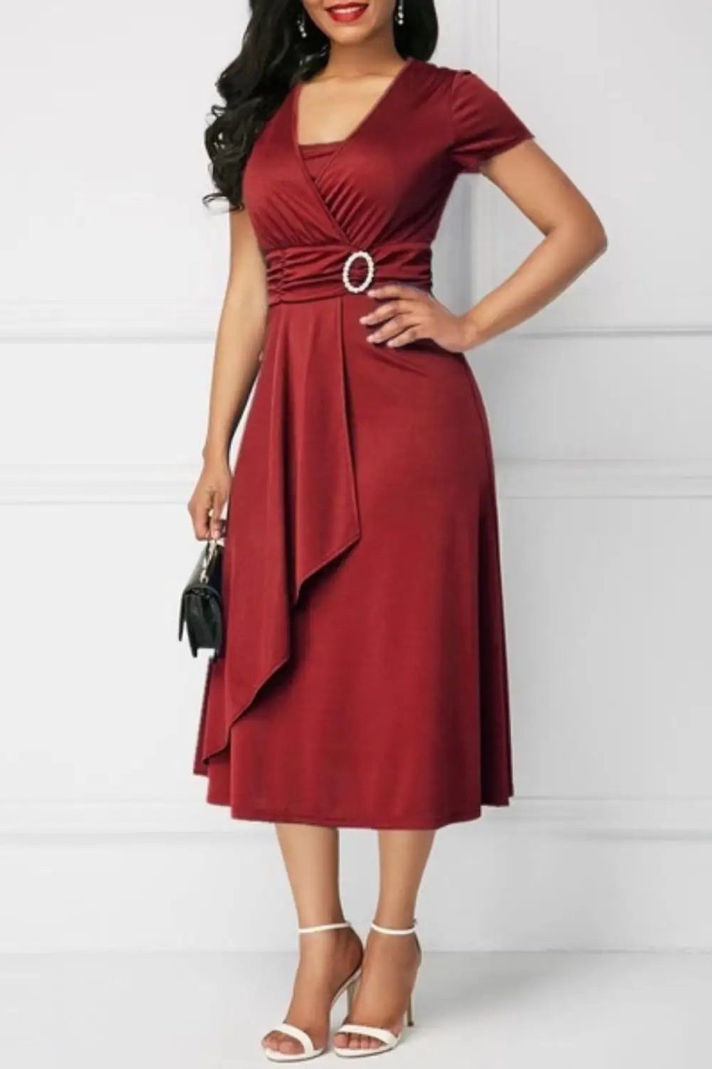Elegant women's midi dress with a flattering silhouette, perfect for parties & evening occasions.