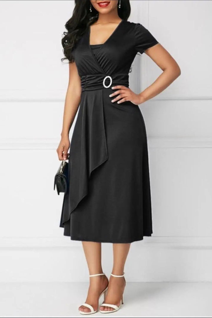 Chic women's printed midi dress, flattering design for elegant casual or party wear.
