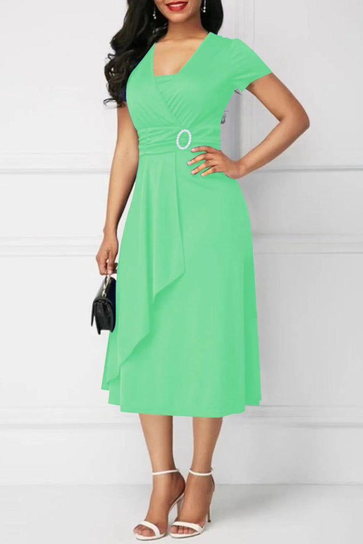 Full-length shot of an elegant women's midi dress, chic and flattering for party or occasion wear.