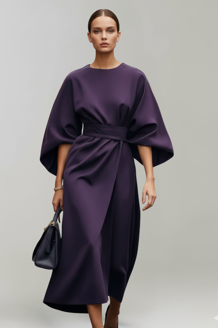 Beautiful women's summer midi dress, designed with a stylish belt and airy wide sleeves for comfort.