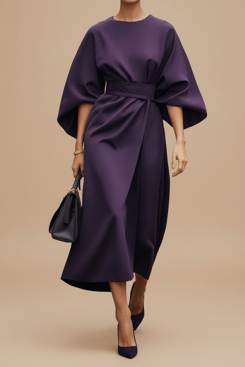 Stylish women's elegant midi dress with beautiful lantern sleeves. Perfect for special events, parties, or wedding guests.