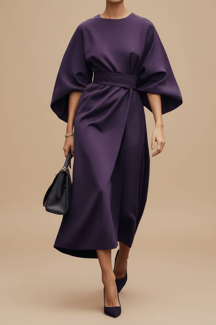 Stylish women's elegant midi dress with beautiful lantern sleeves. Perfect for special events, parties, or wedding guests.