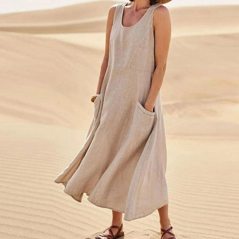 Comfortable sleeveless midi dress for women, ideal for elegant spring fashion & everyday wear with pockets.