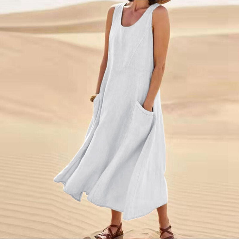 Casual women's midi dress with pockets, providing comfortable & elegant everyday style for spring/summer.