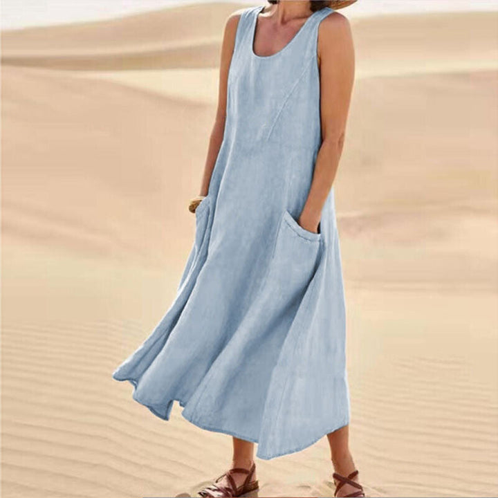 Back view of a sleeveless women's midi dress, elegant & comfortable for spring/summer everyday fashion.