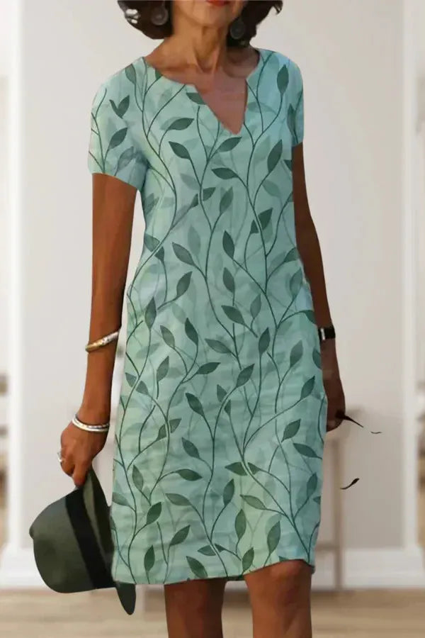 Elegant women's midi dress with waist-defining belt for a flattering, chic style.