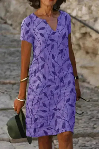 Beautiful women's elegant midi dress, featuring a flattering belt to define the waistline.