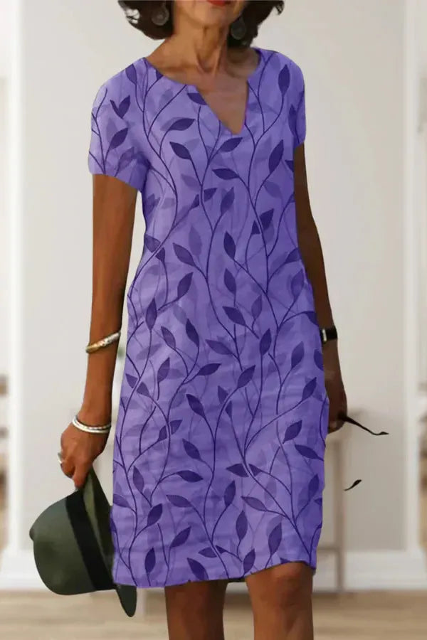 Classic women's elegant belted midi dress, perfect for a flattering summer style & party wear.