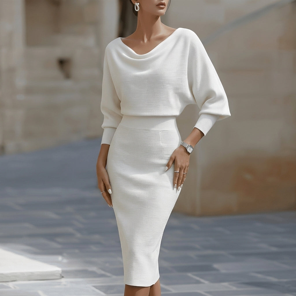 Elegant women's midi slip dress for versatile day to evening wear. Features adjustable straps and a stylish side slit.