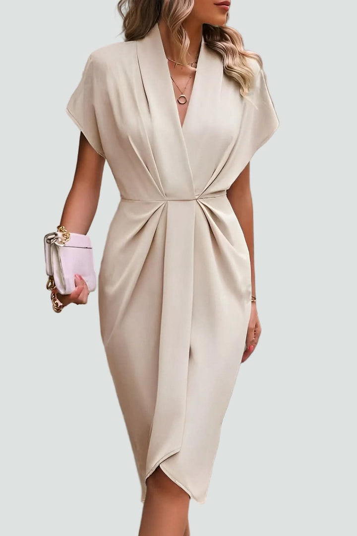 Women's flattering midi wrap dress featuring a graceful V-neck & long sleeves for elegant wear.