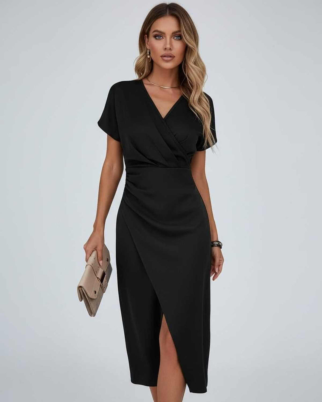 Comfortable & stylish women's midi wrap dress. Features a flattering V-neck, short sleeves, and trendy split hem.