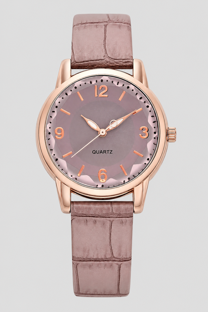 Elegant women's minimalist watch with classic embossed strap, perfect for dressy or professional wear.