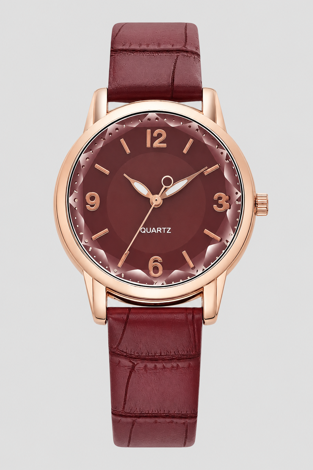 Timeless classic women's watch with an elegant minimalist face and intricately embossed strap for lasting style.