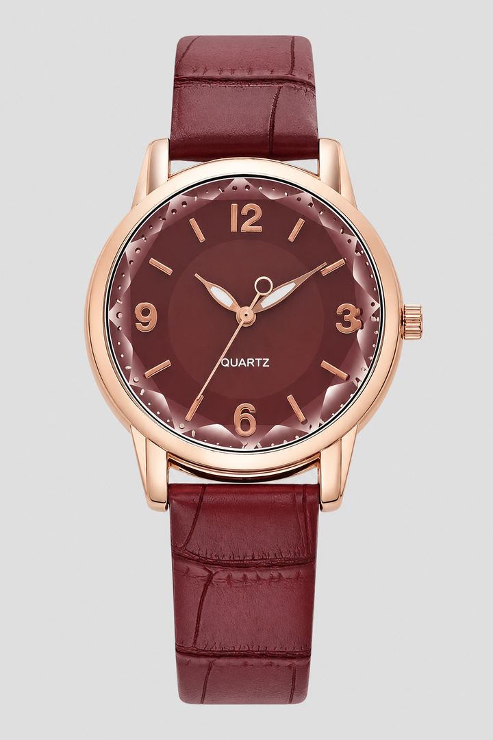 Timeless classic women's watch with an elegant minimalist face and intricately embossed strap for lasting style.