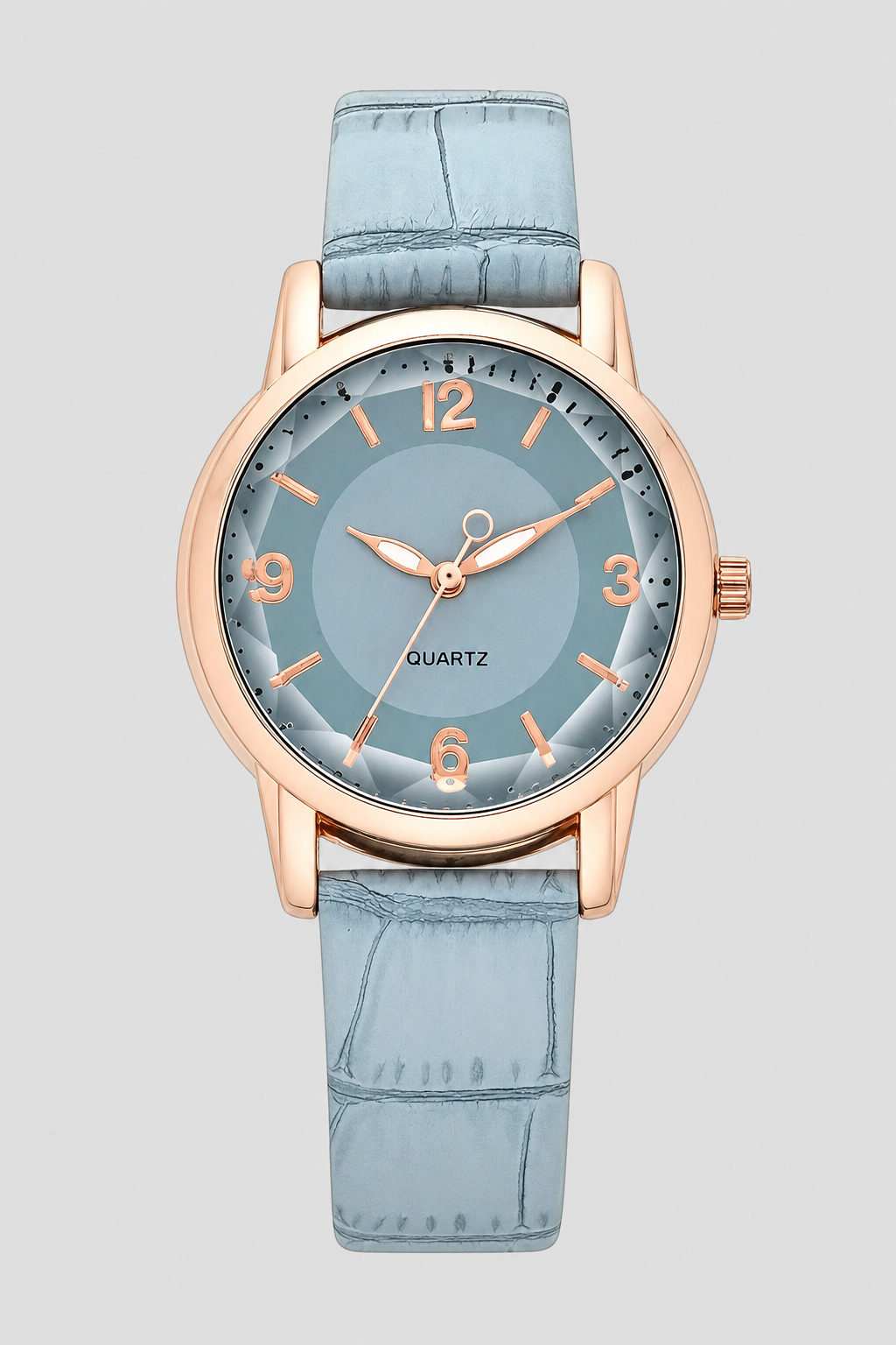 Chic women's dress watch with a minimalist aesthetic and a distinctive embossed strap, enhancing any outfit.