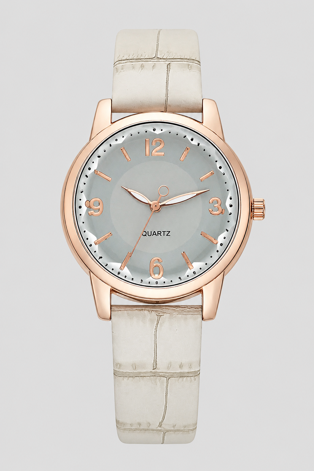 Fashionable women's accessory watch, featuring a clean minimalist dial and a textured embossed strap.