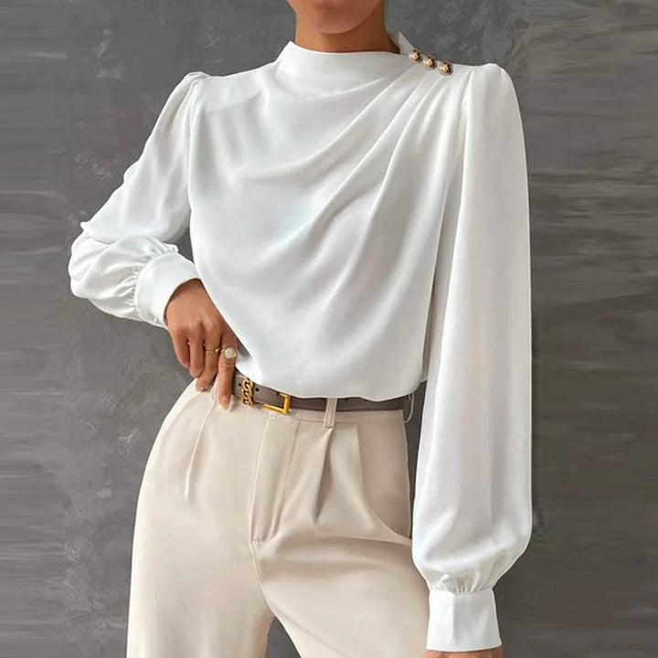Sophisticated women's long sleeve ruched mock neck top with gold buttons, ideal for dressy occasions or office fashion.