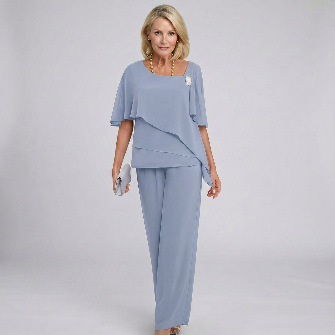 Elegant women's navy blue wide leg two-piece formal set with flutter sleeves, perfect for wedding guests & evening wear.