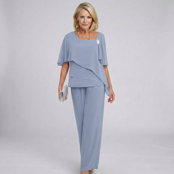 Elegant women's navy blue wide leg two-piece formal set with flutter sleeves, perfect for wedding guests & evening wear.