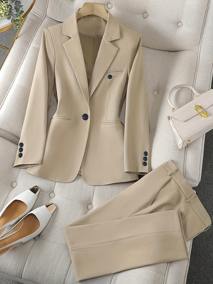 New women's elegant blazer & pant suit. Tailored, professional office wear for modern women.