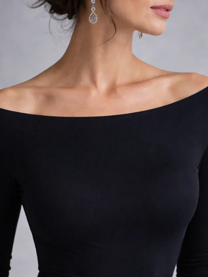 Elegant women's off-shoulder long sleeve maxi evening dress. A flattering fit for sophisticated formal occasions.