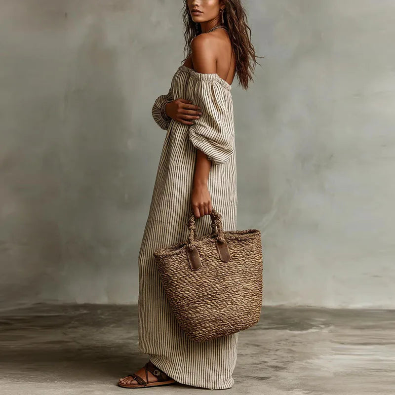 Women's casual elegant off-shoulder maxi dress, perfect as a summer party or vacation dress.
