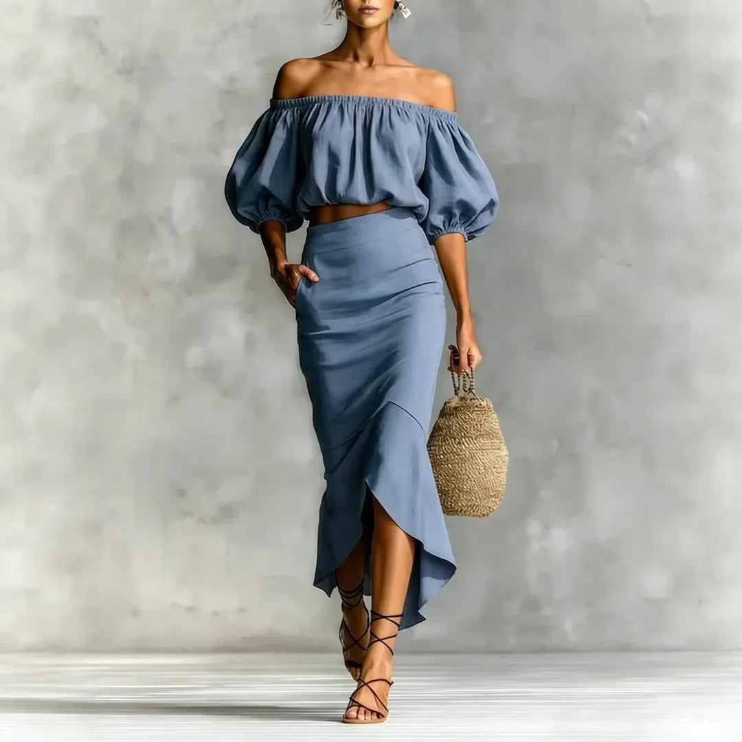 Chic women's summer vacation two-piece set: an off-shoulder puff sleeve crop top and a midi wrap skirt.