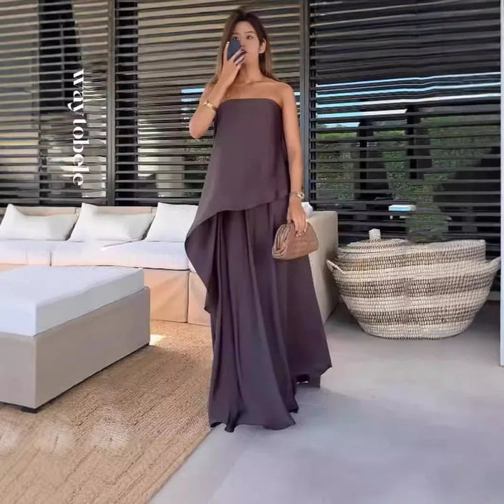 Comfortable & versatile women's off-shoulder top & maxi skirt set, ideal for casual chic or travel fashion.