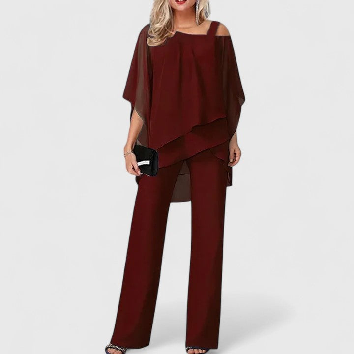 Elegant women's off shoulder two piece set featuring a stylish top and wide leg pants, perfect for formal occasions.