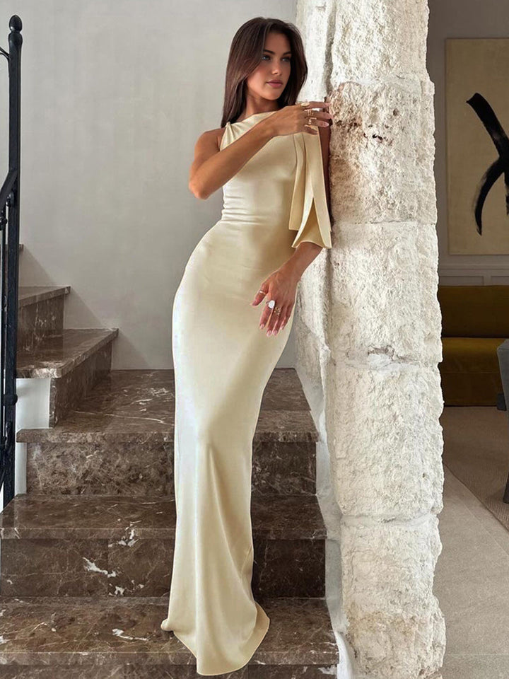 Sleek off-white long satin gown with a stylish knotted front, ideal as a wedding guest or special occasion dress.