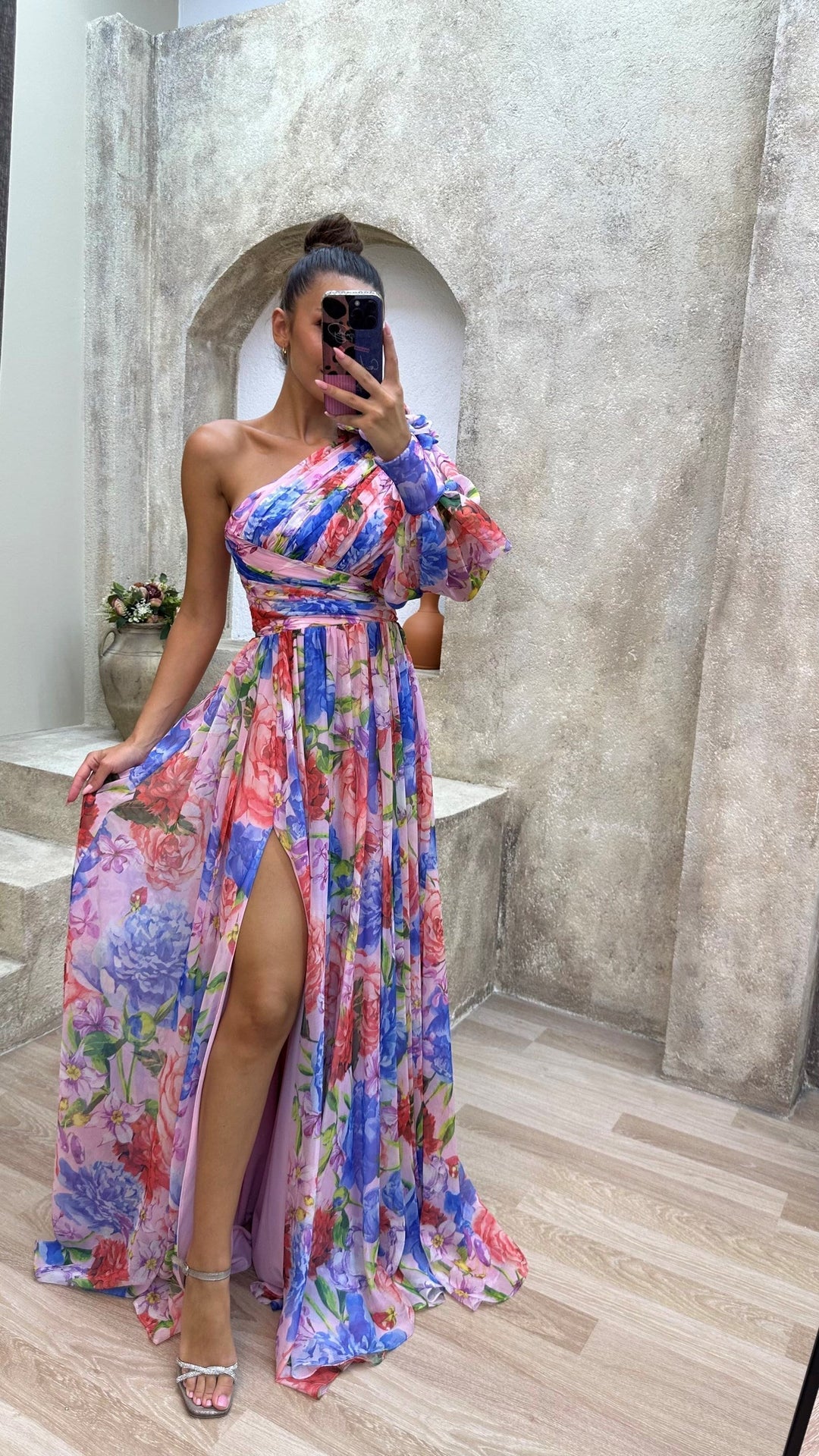 Effortless elegance in a women's one-shoulder maxi dress, a chic and comfortable party or evening outfit.