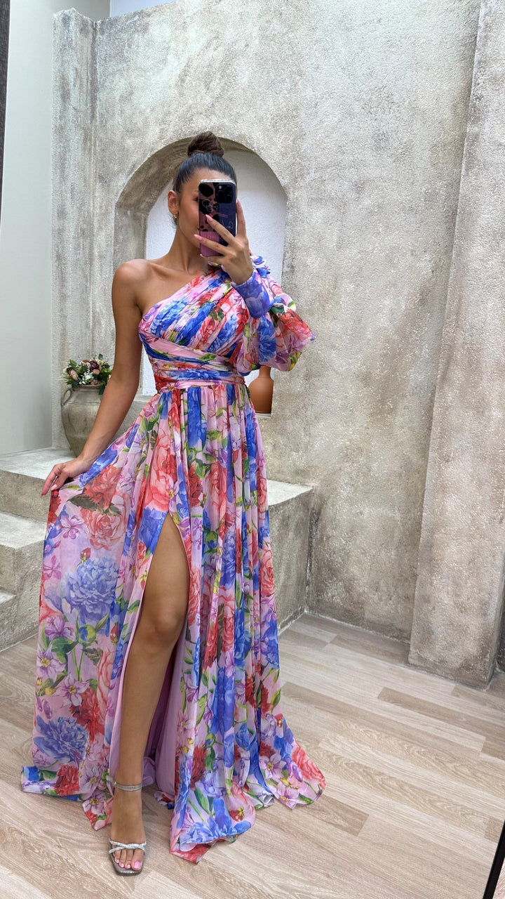 Effortless elegance in a women's one-shoulder maxi dress, a chic and comfortable party or evening outfit.