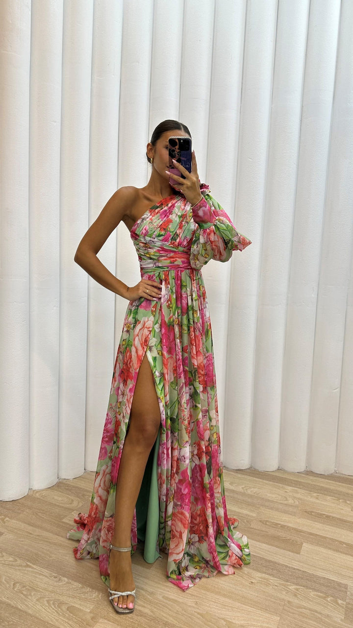 Vibrant women's one-shoulder flowy maxi dress, perfect for an elegant spring garden party or summer evening.