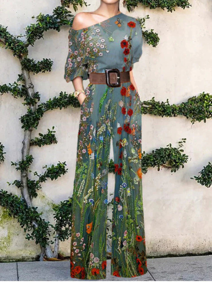 Women's elegant one-shoulder printed jumpsuit with wide legs, a perfect statement piece for parties.