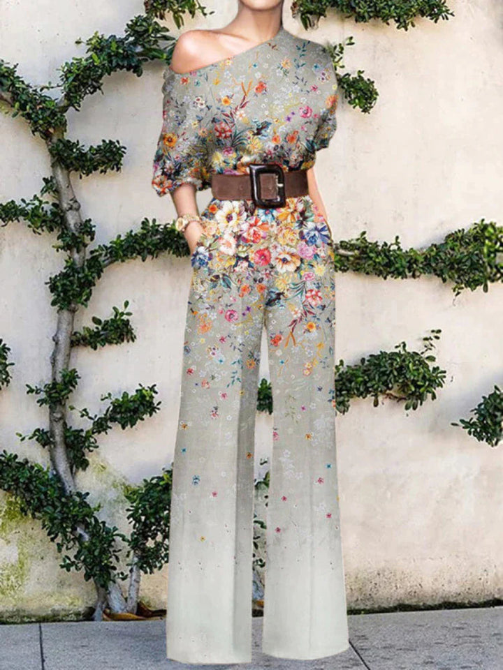 Casual chic women's printed one-shoulder wide leg jumpsuit, great for summer fashion and resort style.