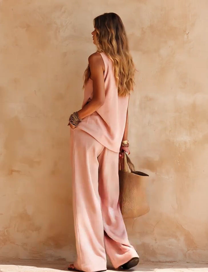 Stylish women's one-shoulder wide-leg jumpsuit featuring a graceful drape. Ideal for parties & formal events.