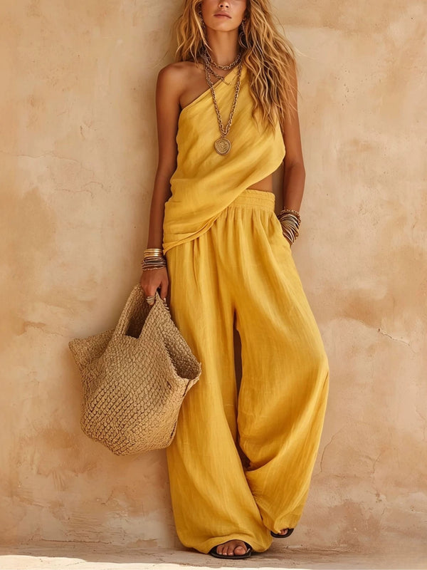 Draped one-shoulder wide-leg jumpsuit for women, stylish & comfortable. Perfect for summer vacation.