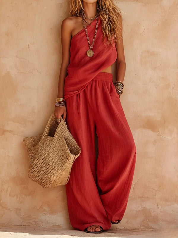 Stylish women's one-shoulder jumpsuit with wide legs & elegant draping. Ideal for formal or vacation.