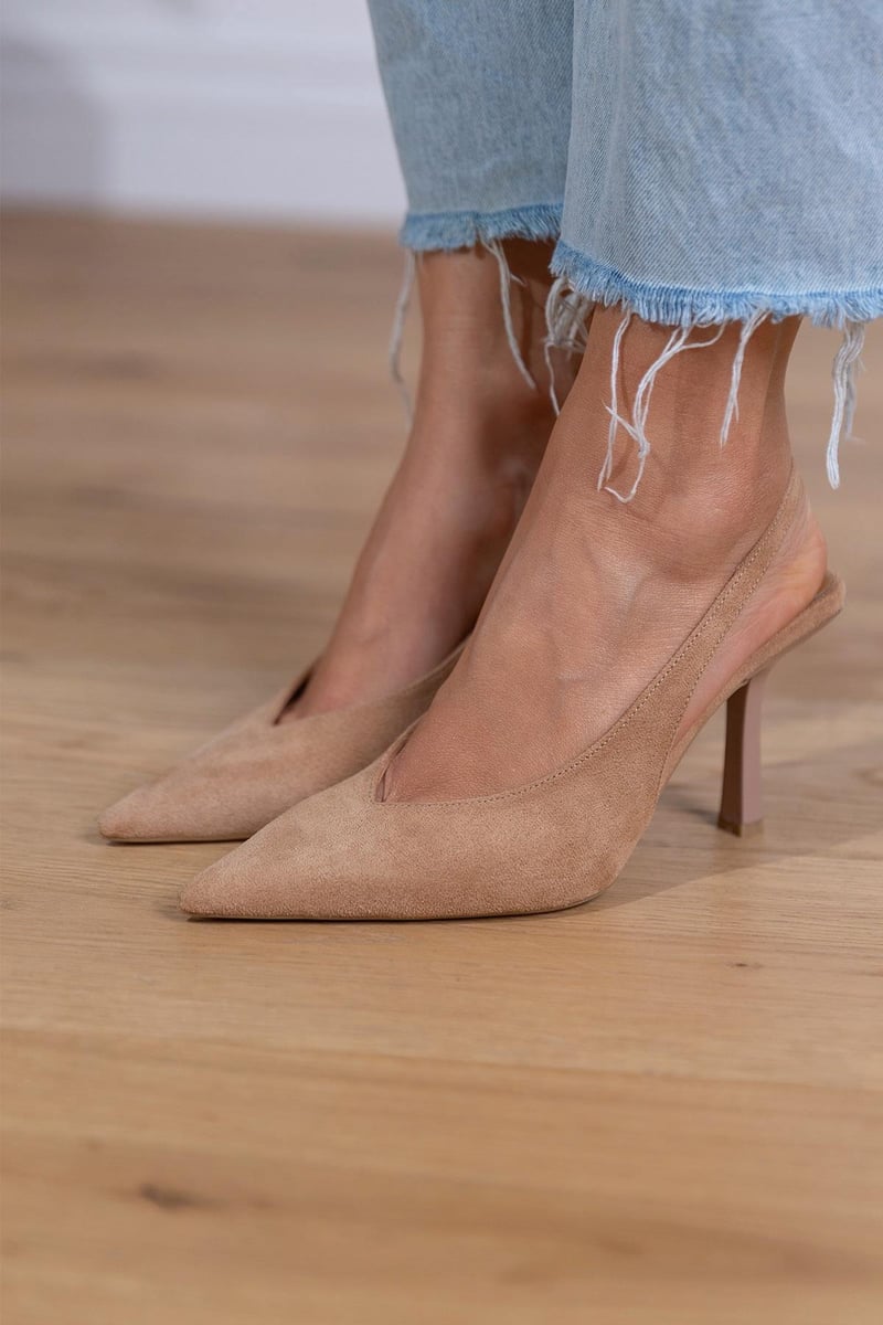 Elegant women's orthopedic slingback pointed toe heels. Comfortable beige dress shoes for work or fashion.