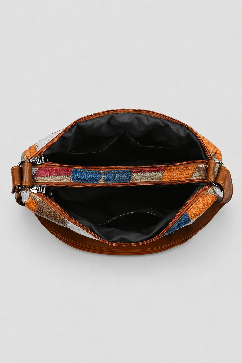 Unique women's patchwork shoulder bag, an elegant fashion handbag. Artistic design for a versatile, stylish everyday bag.