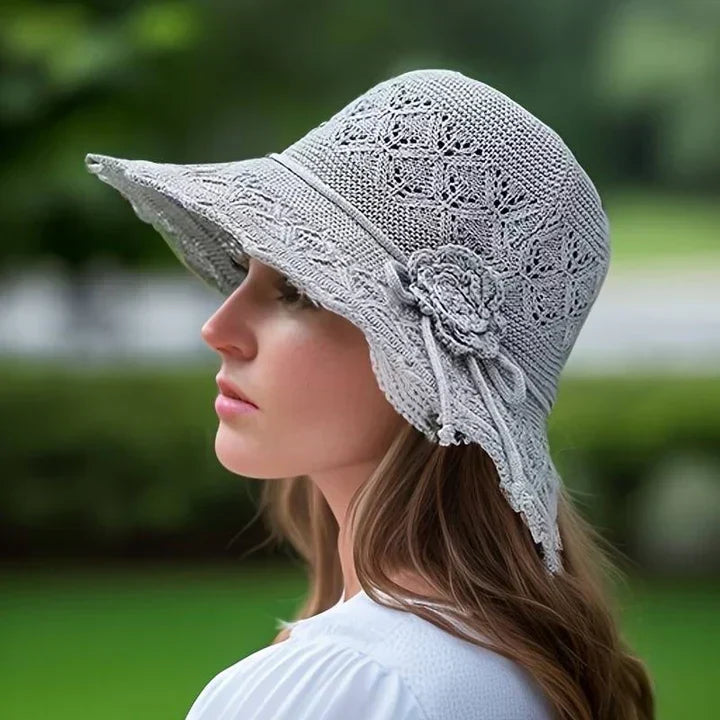Foldable women's patterned wide brim sun hat, ideal summer accessory for beach trips and travel.