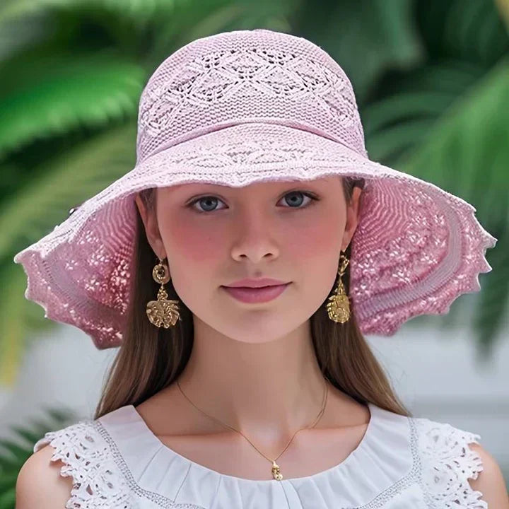Patterned wide brim foldable sun hat for women, an elegant and practical accessory for summer holidays.