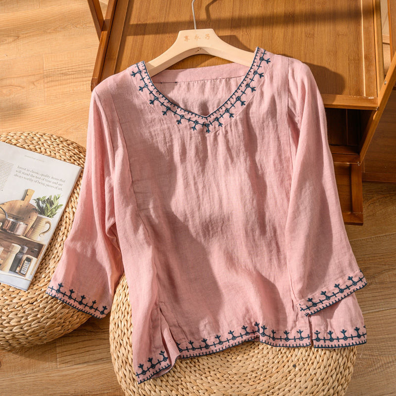 Loose fit women's patterned V-neck short sleeve blouse. Comfortable & stylish casual top for summer and spring.