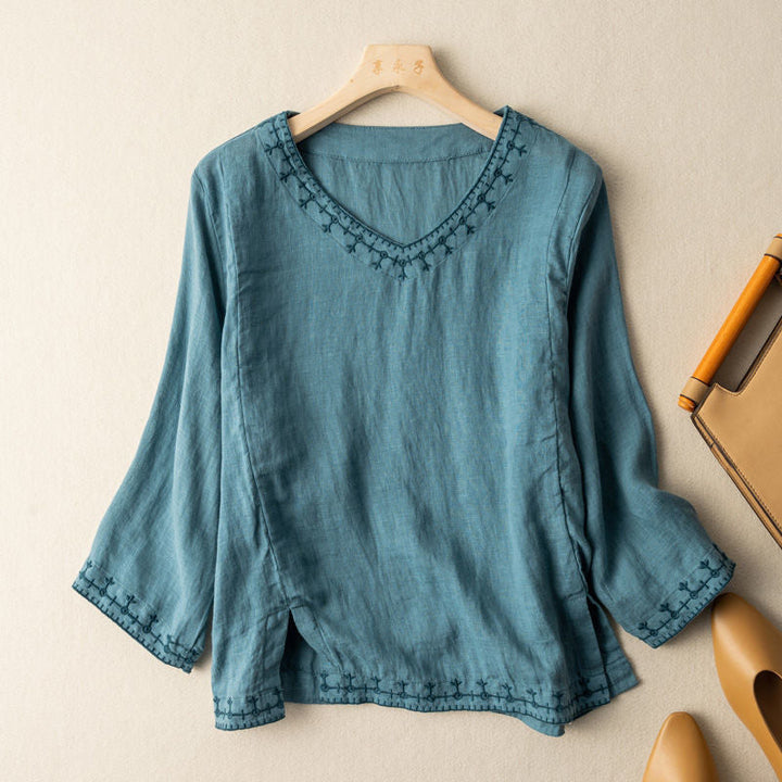 Stylish women's patterned V-neck short sleeve blouse. Elegant top, loose fit, perfect for casual spring & summer.