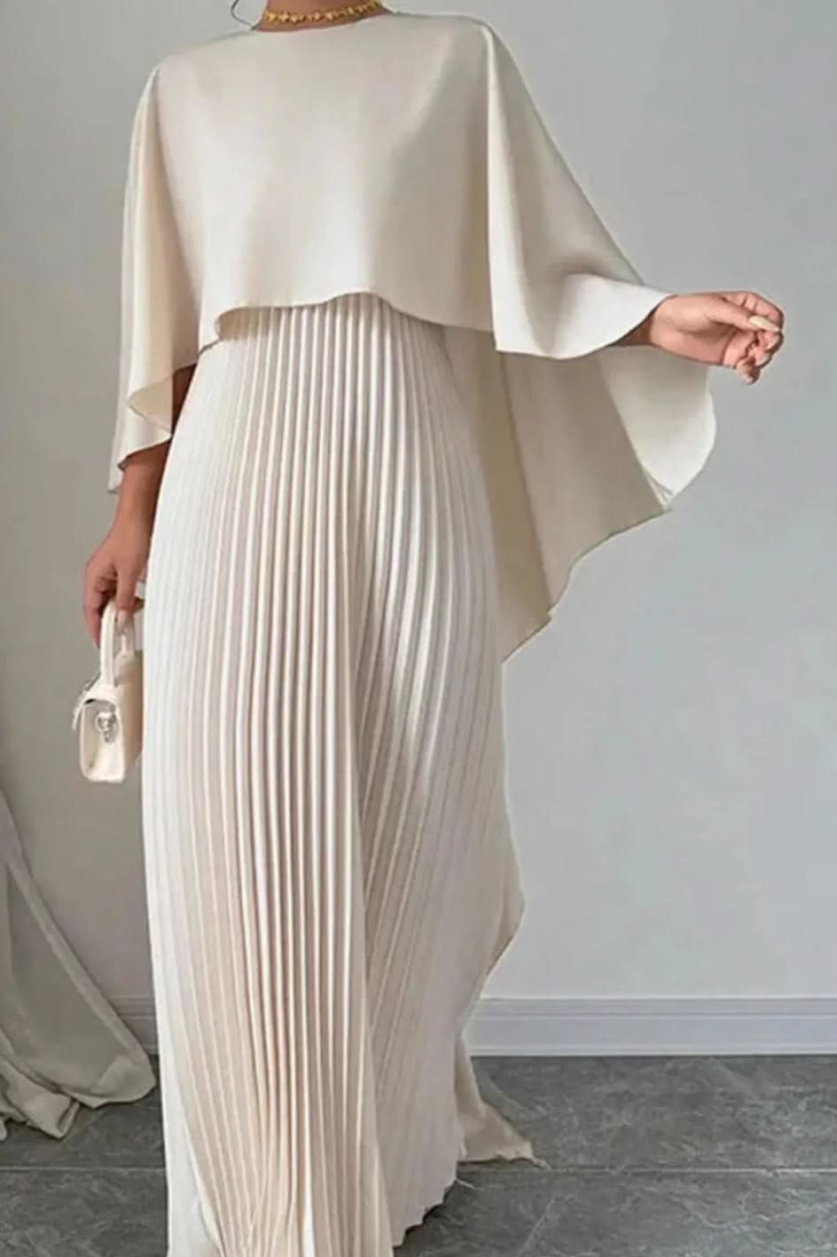 Elegant women's pleated cape maxi dress in black, perfect for evening events, galas, or wedding guests.